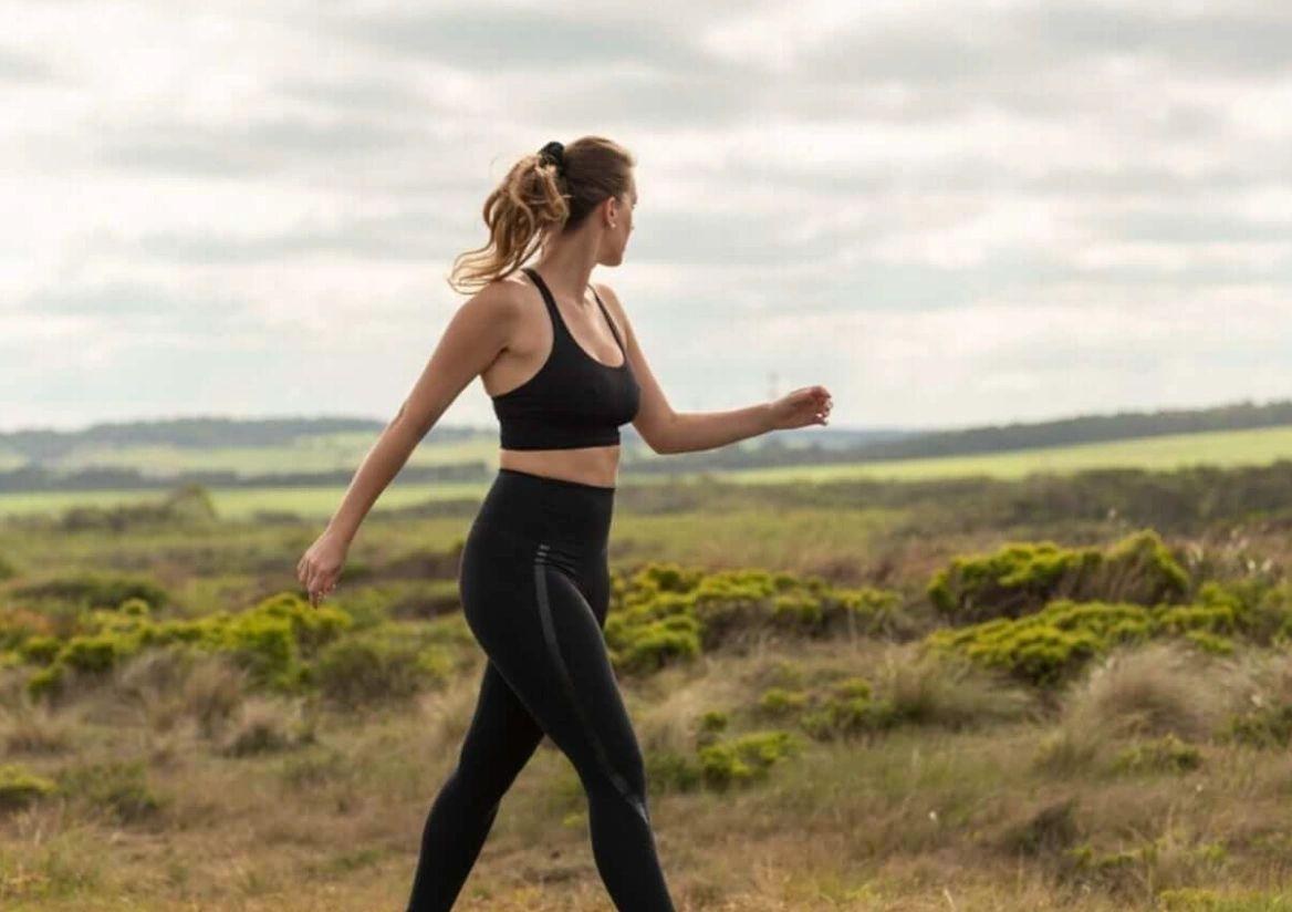 A woman walking in a field