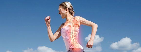 A woman running with a skeletal overlay showing her spine and ribcage